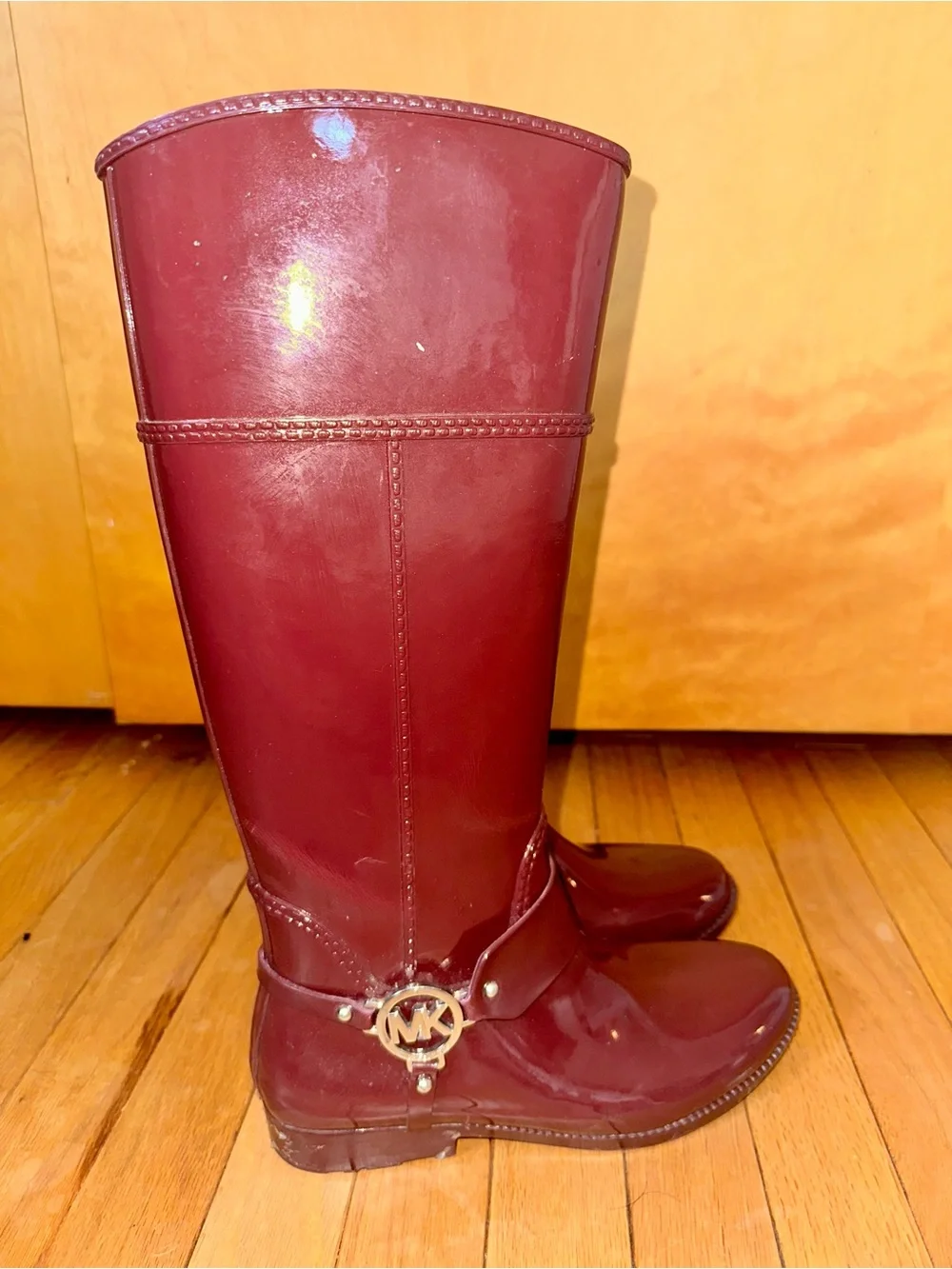 Michael Kors Glossy Burgundy Knee-High Rain Boots with Gold MK Accent